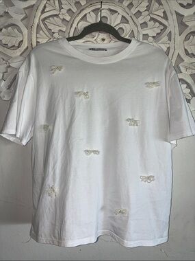 Zara White Short-Sleeve Crewneck T-Shirt with Embroidered Bow Accents